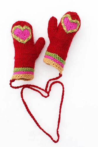 Red mittens with a pink heart