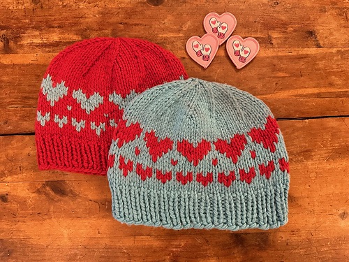 Red and grey heart hats