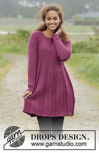 Young woman wearing a pink dress with long sleeves