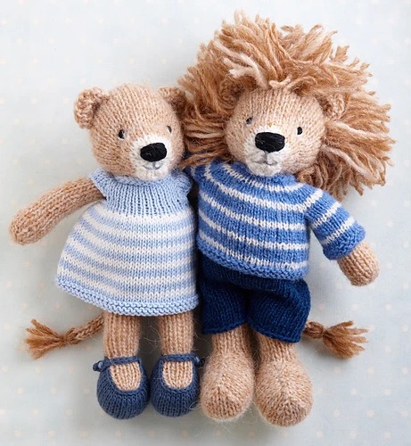 A pair of toy knit lions