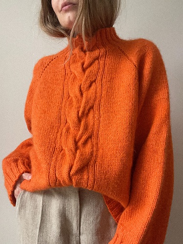 Orange mohair sweater with front cable detail