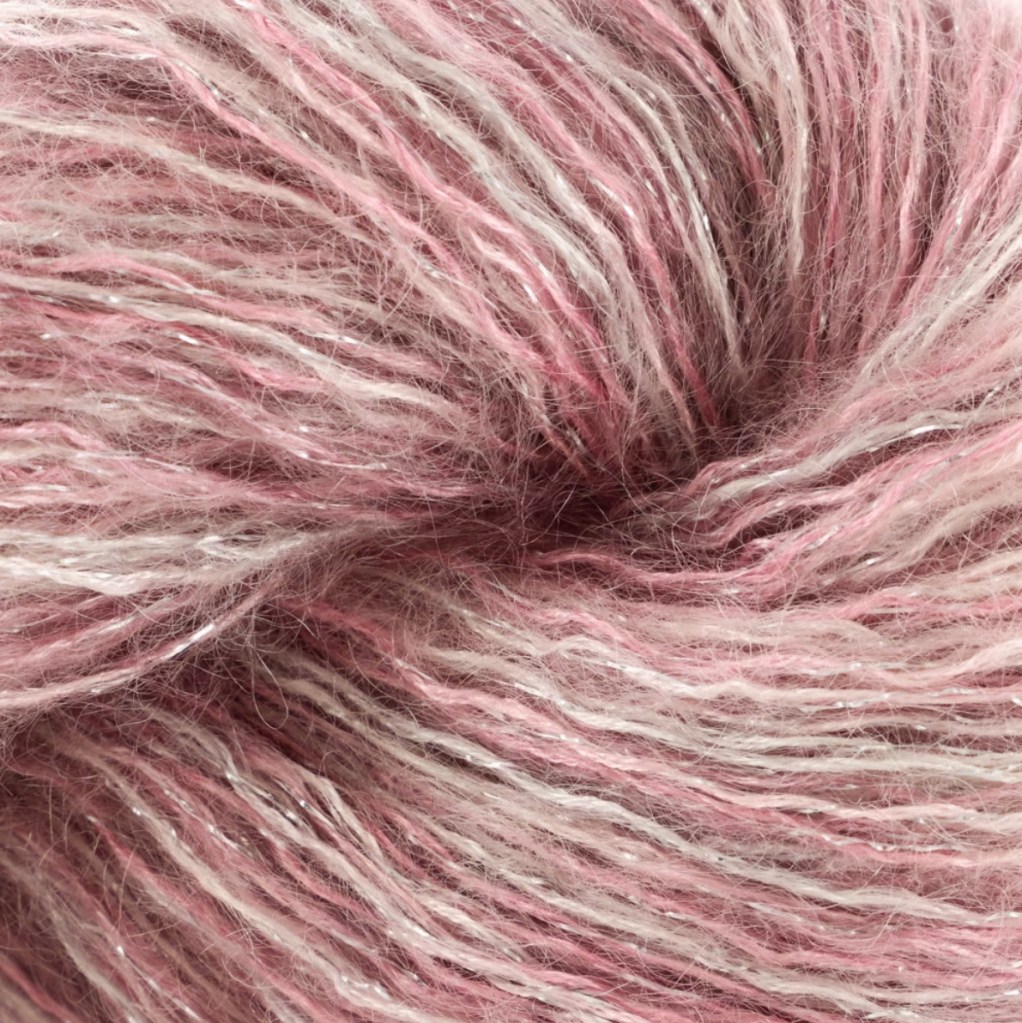 Close up of variegated pink and white yarn