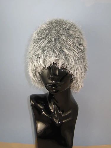 Silver faux fur hat on a mannequin 