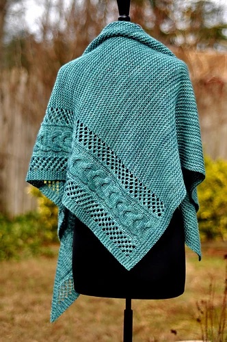 Green knit shawl with cable detail