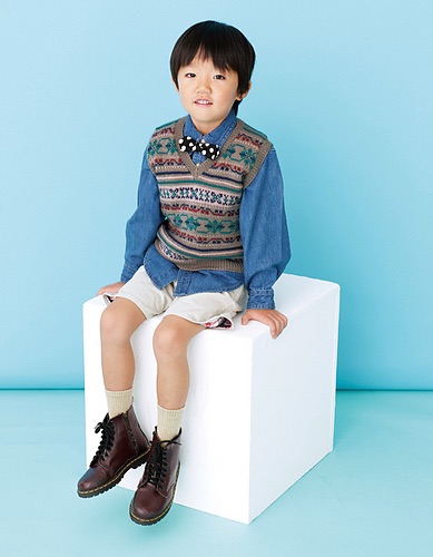 Child wearing a fair isle vest