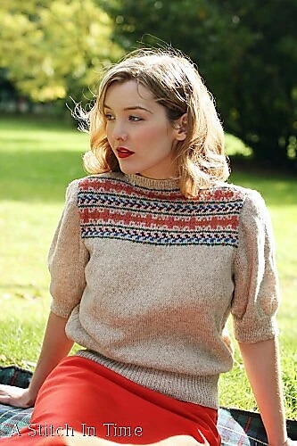 Person wearing a fair isle short sleeve sweater