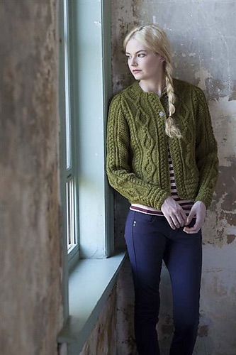 Person wearing a green knit cardigan