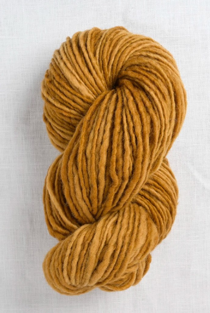 Skein of golden yarn