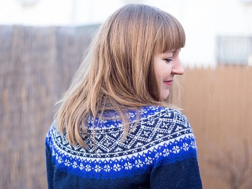 Person wearing a fair isle jumper